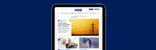 iPad mit noz Portal vor blauem Hintergrund